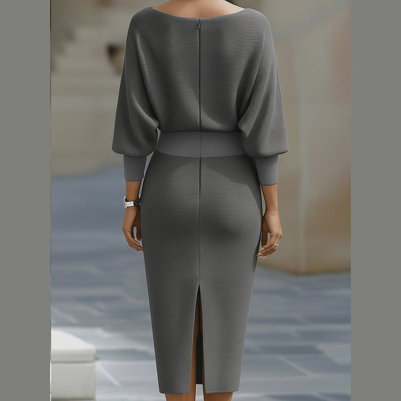 Women's grey draped midi dress – back view with slit