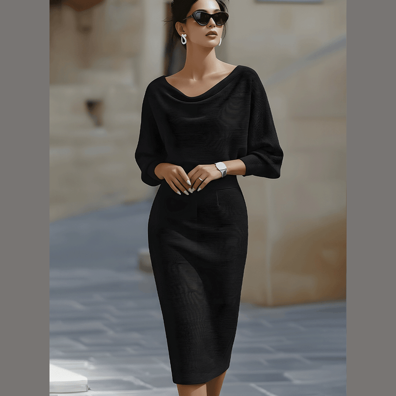 Woman wearing the black draped midi dress