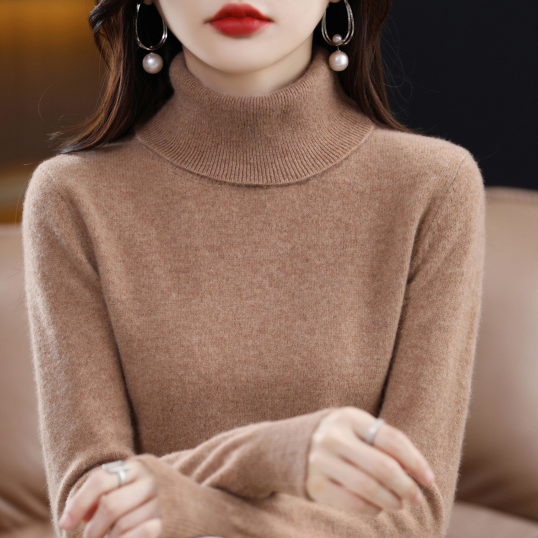 Woman wearing a camel turtleneck sweater