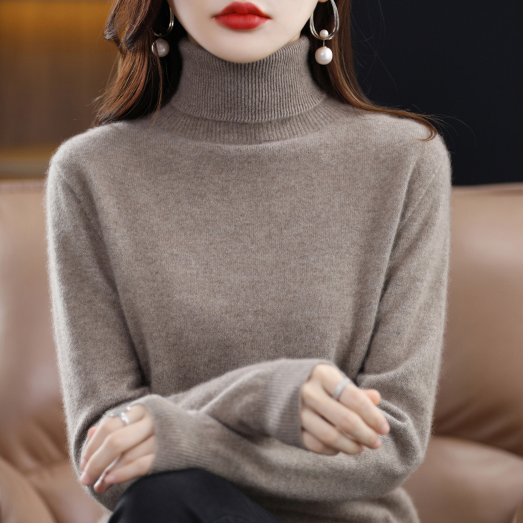 Woman wearing a taupe fine knit turtleneck