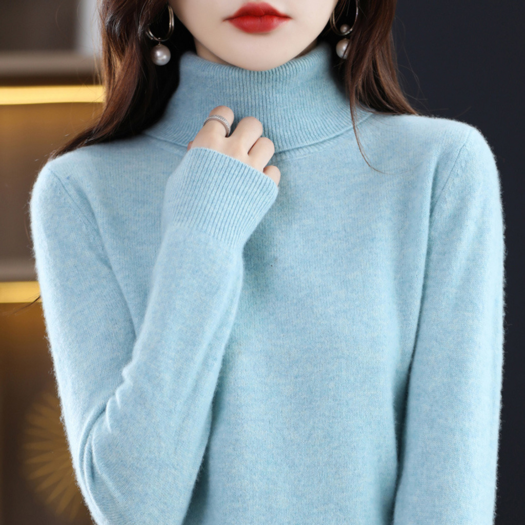 Woman wearing a light blue fine knit turtleneck