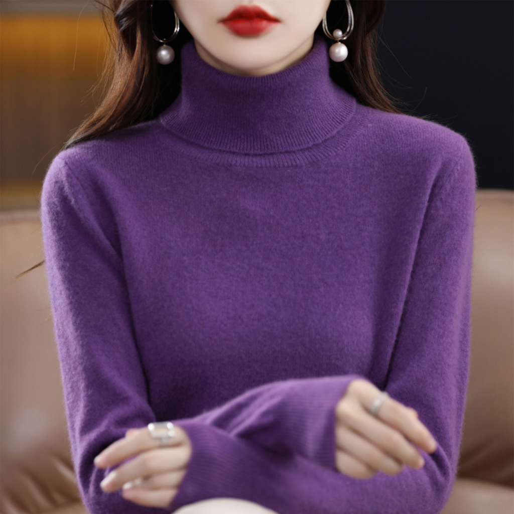 Woman wearing a purple turtleneck sweater