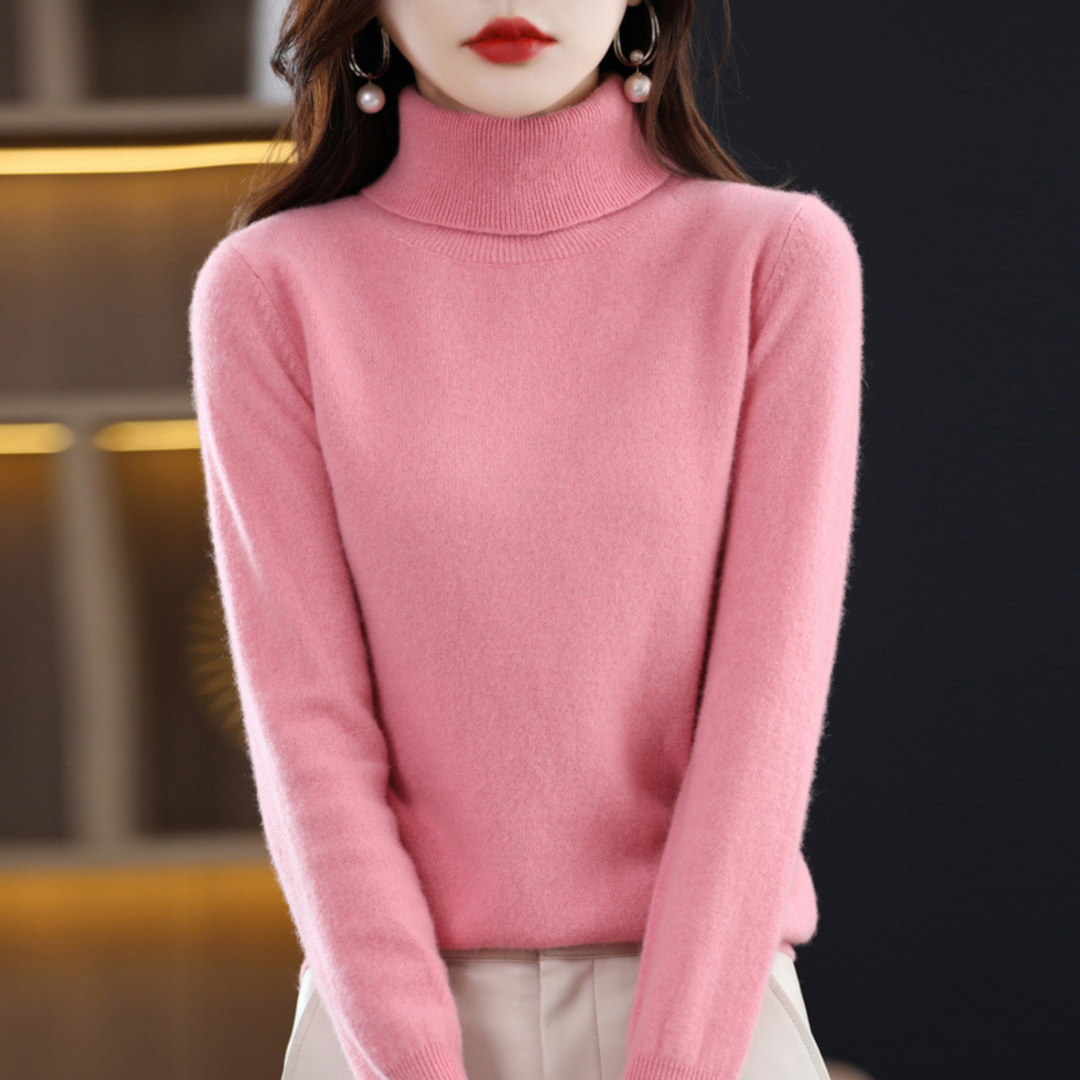 Woman wearing a pink turtleneck sweater