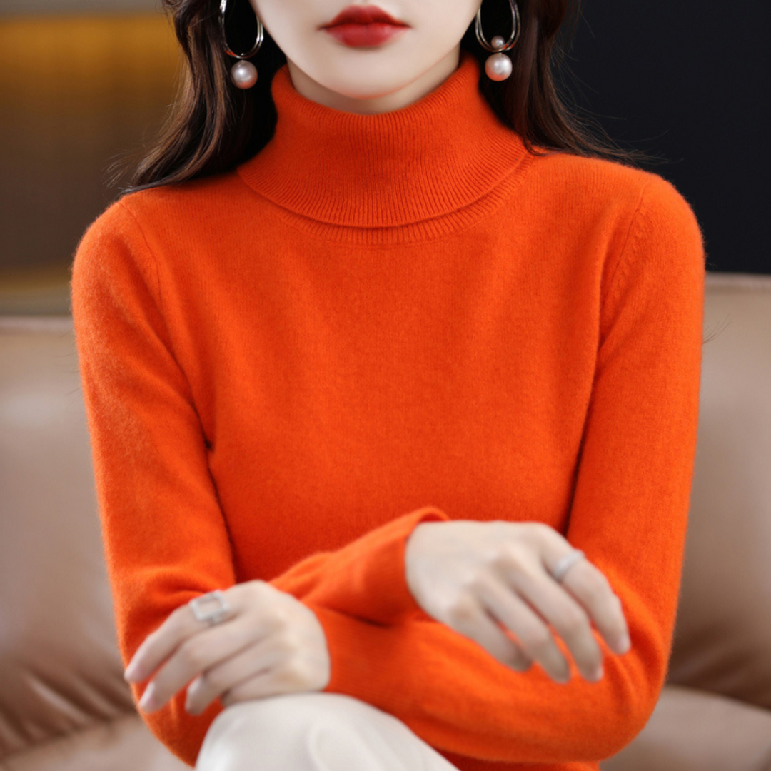 Woman wearing an orange fine knit turtleneck