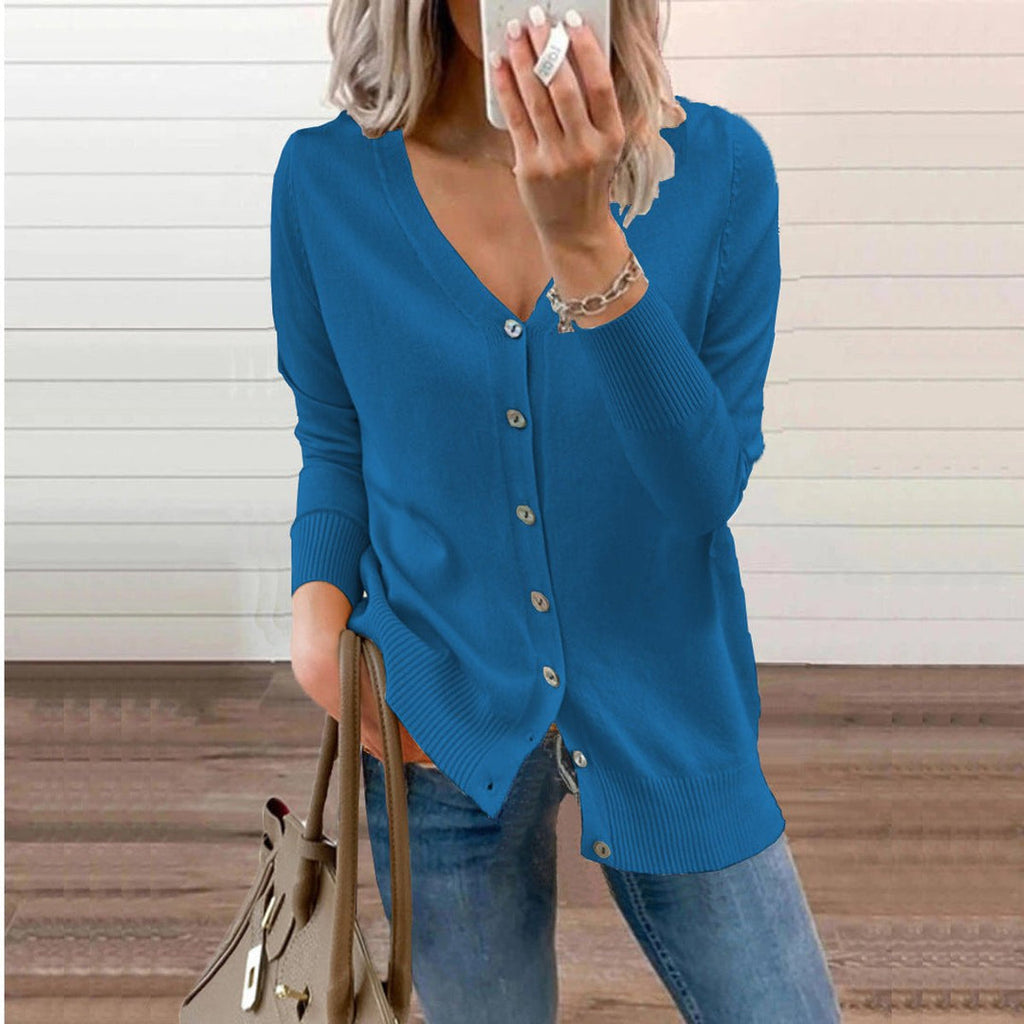 Woman wearing a blue fine knit V-neck cardigan