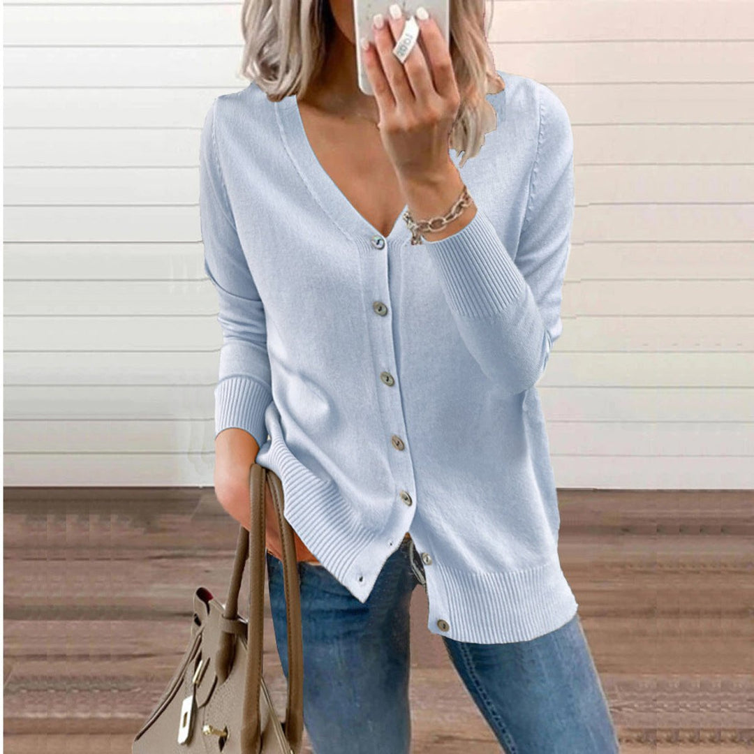 Woman wearing a light blue fine knit cardigan