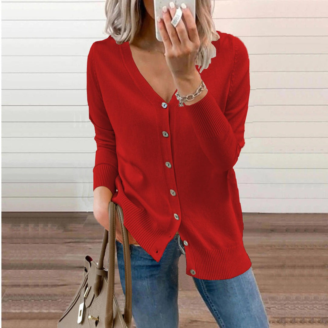 Woman wearing a red V-neck cardigan