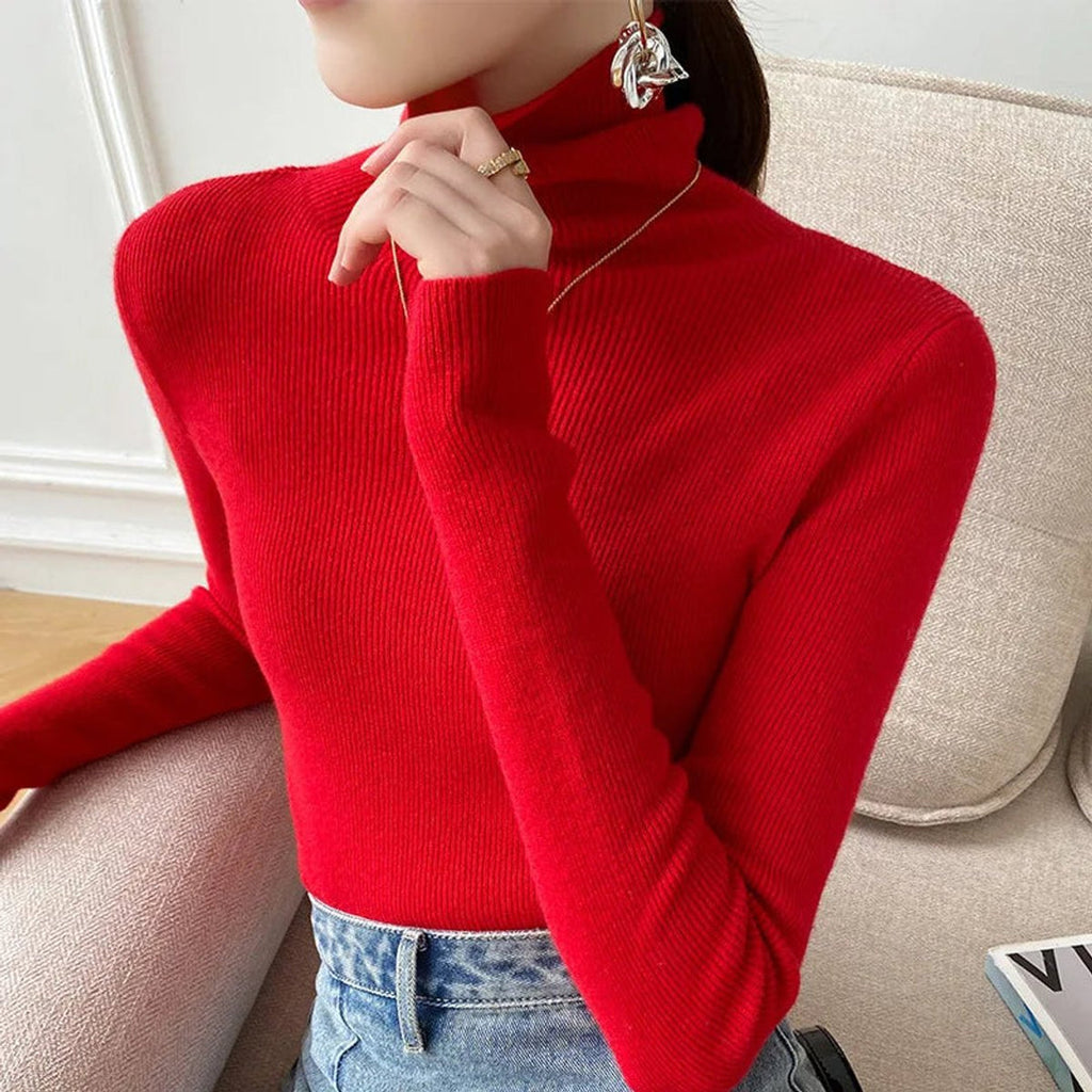 Woman wearing a red fitted turtleneck sweater