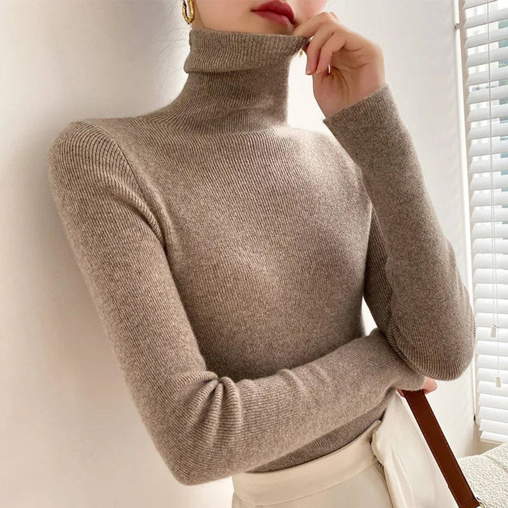 Woman wearing a camel soft knit turtleneck