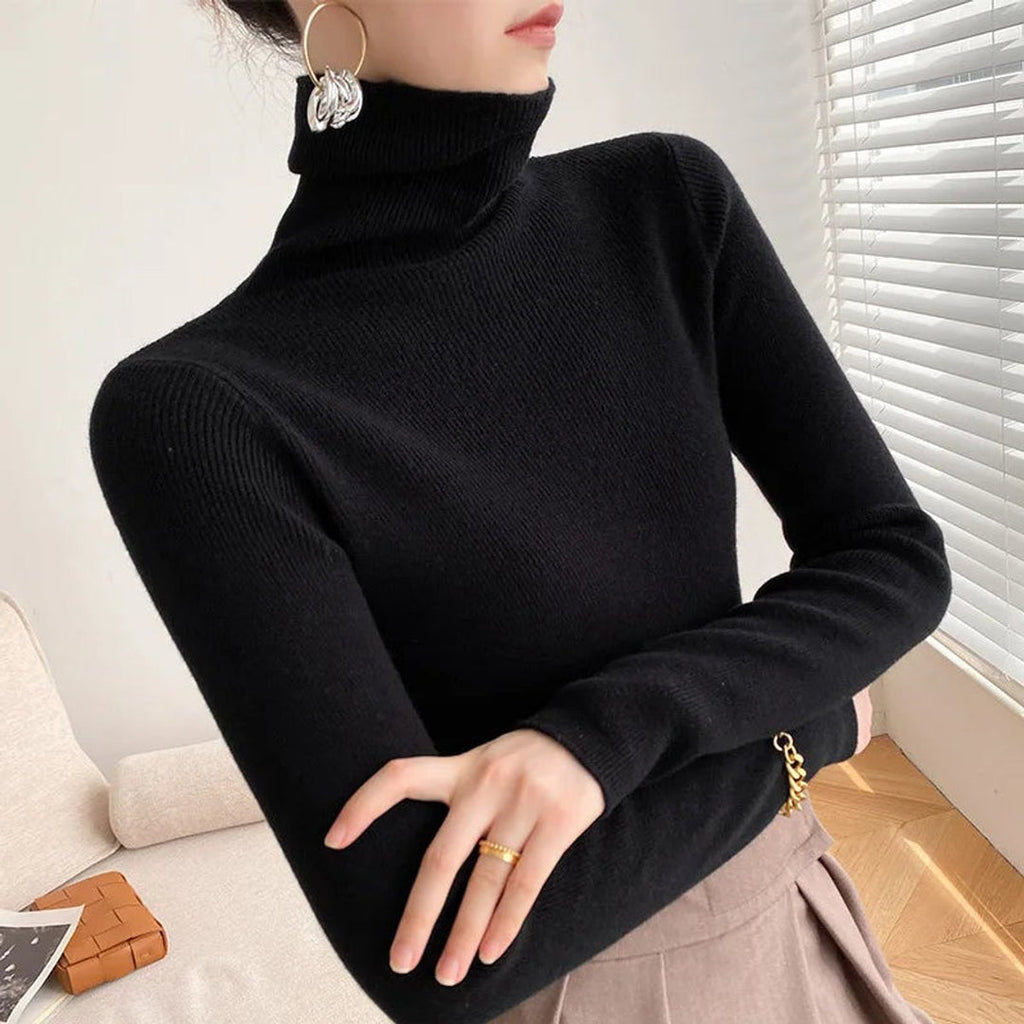 Woman wearing a black turtleneck sweater
