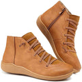 Women's brown flat ankle boots with crisscross laces