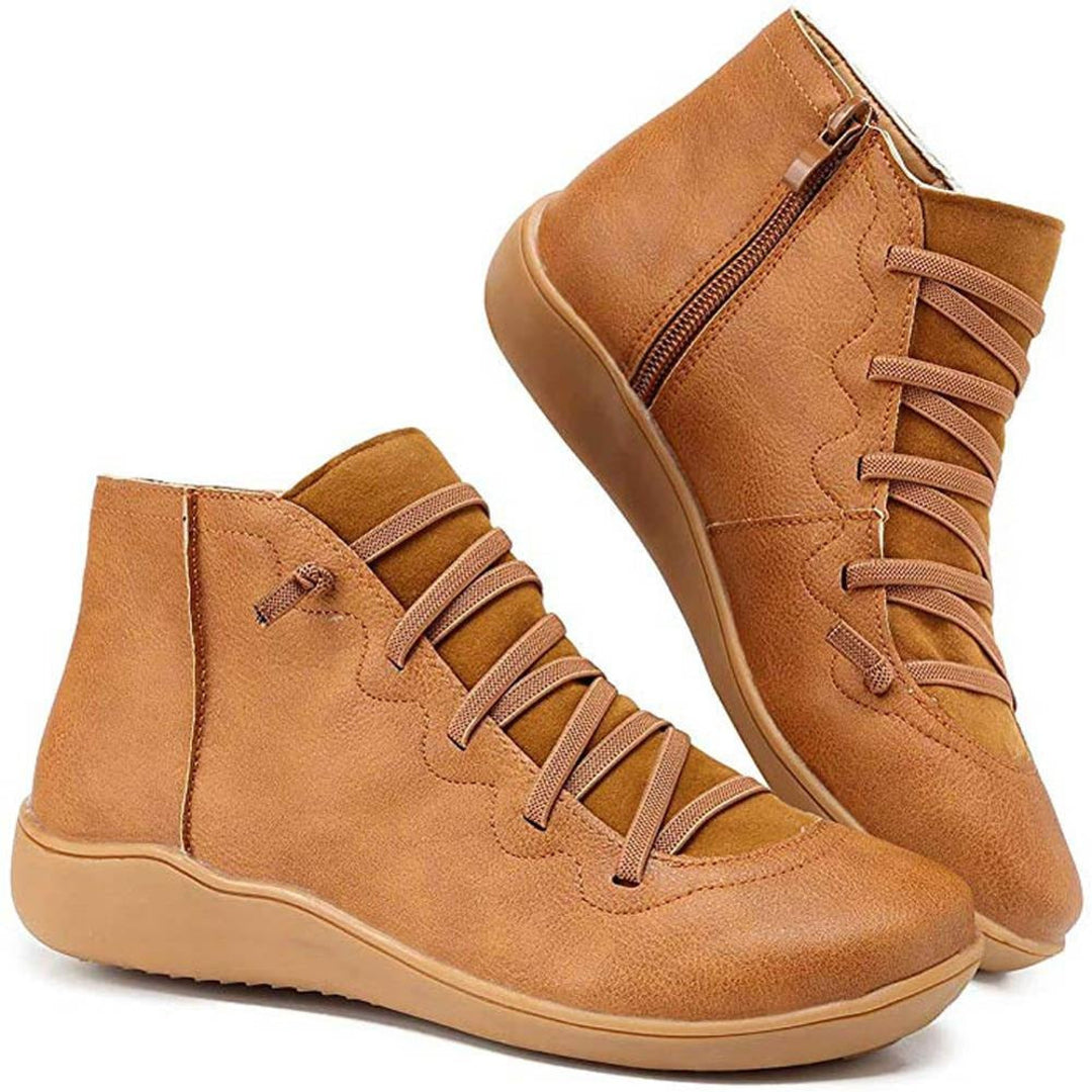 Women's brown flat ankle boots with crisscross laces