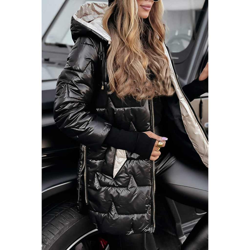 Woman wearing a black high-shine quilted jacket