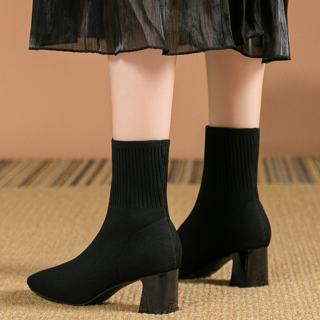 Women's black knit sock ankle boots with block heel