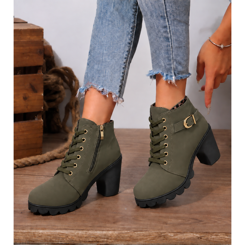 Woman wearing army green block heel ankle boots