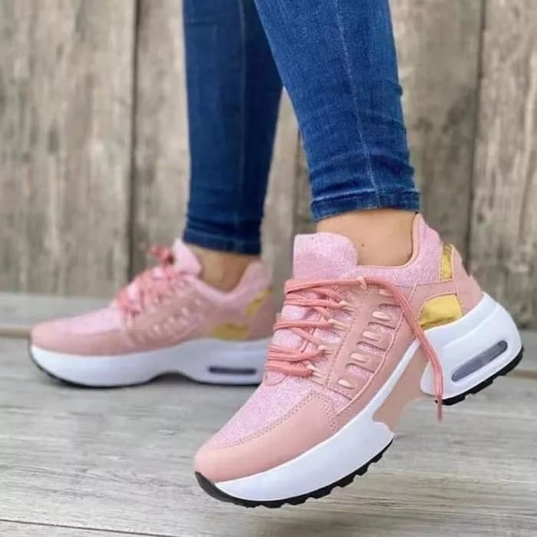 Women's pink lace-up sneakers