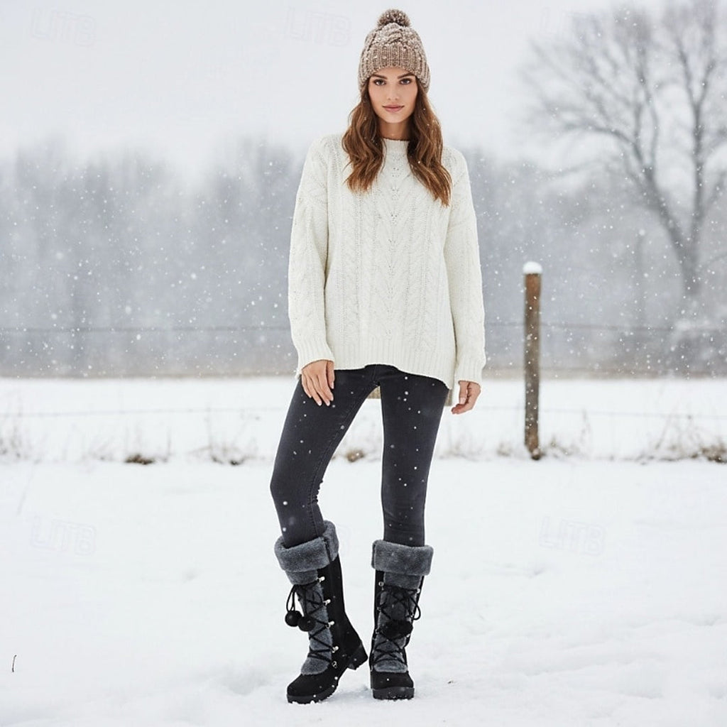 Woman wearing black pom-pom winter boots outdoors