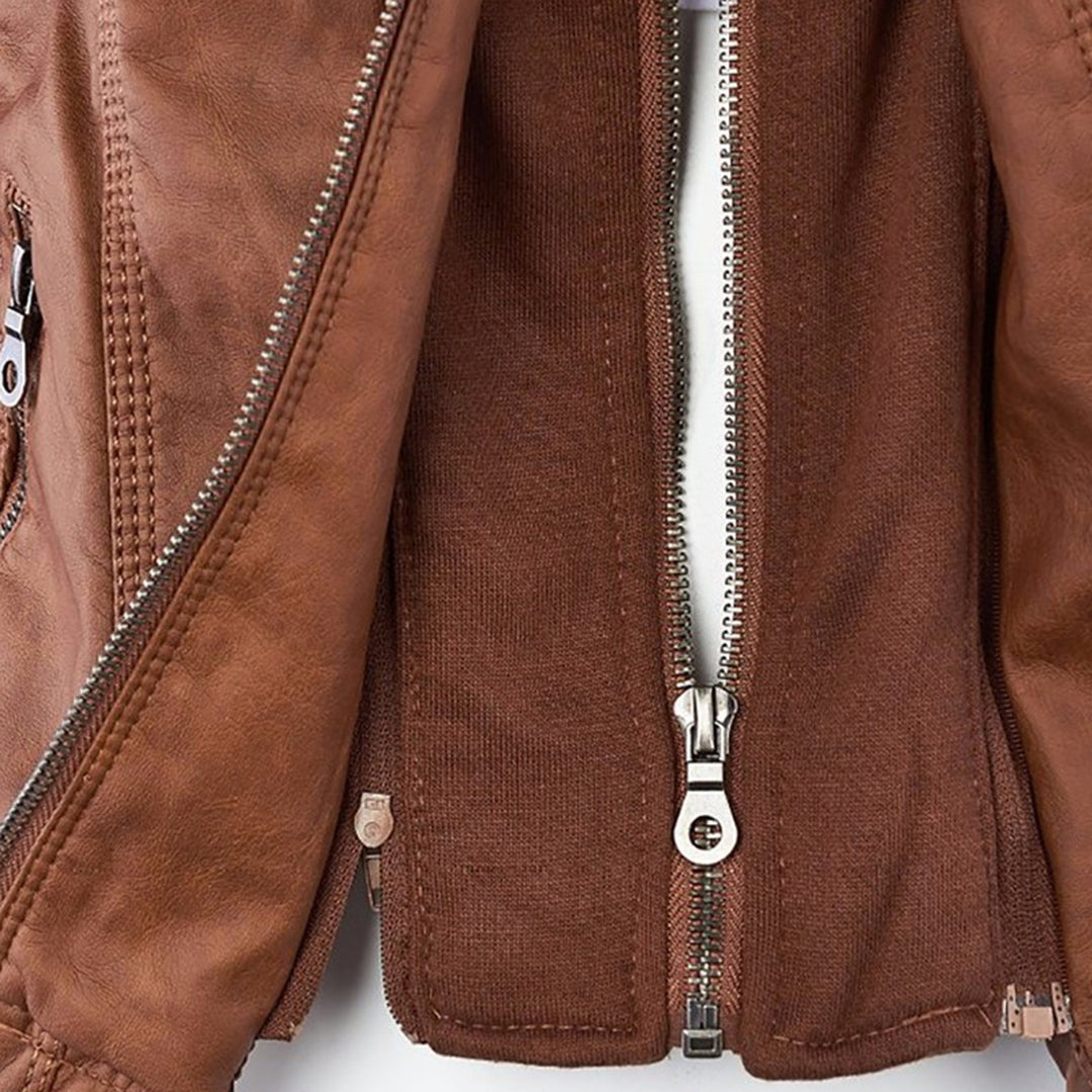 Close-up of the zip on the camel leather-look jacket