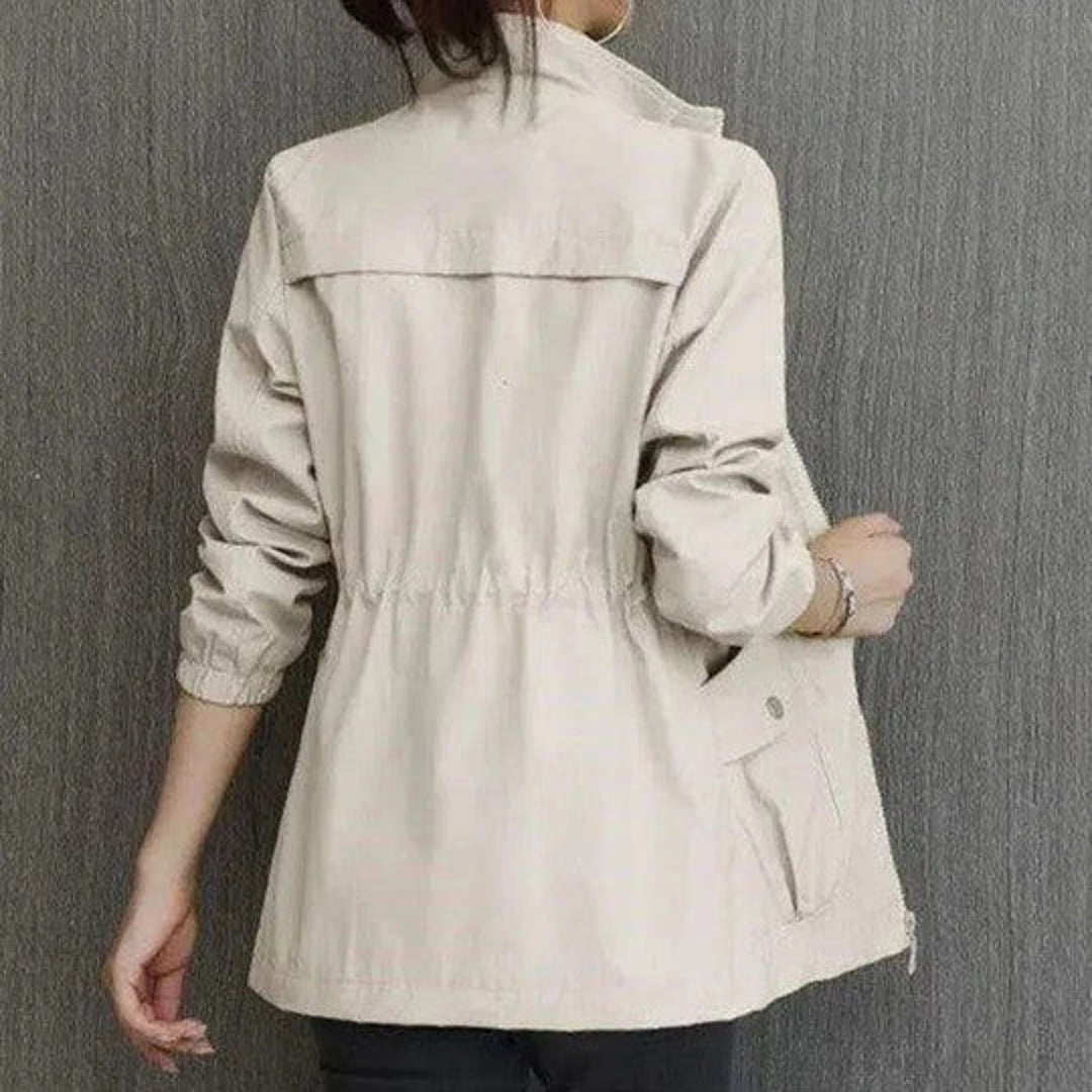 Women's beige lightweight jacket – back view with drawstring waist