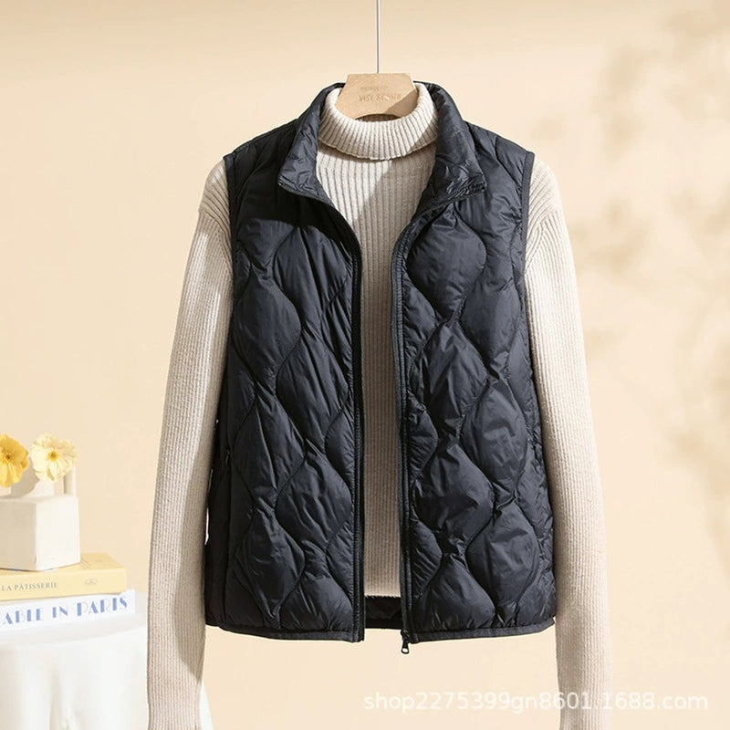 Women's lightweight quilted vest with stand collar in black