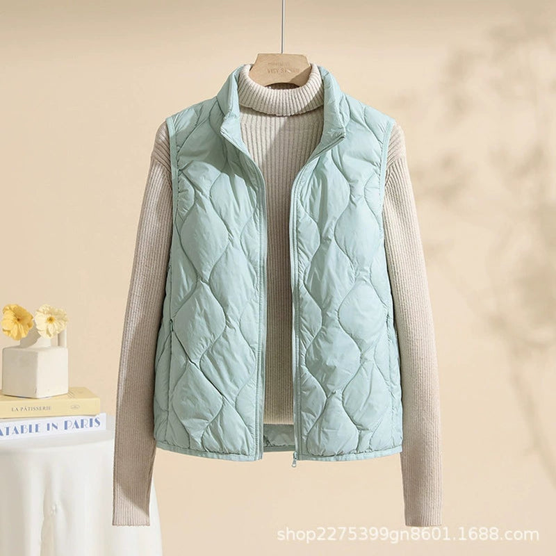 Women's lightweight quilted vest with stand collar in mint green