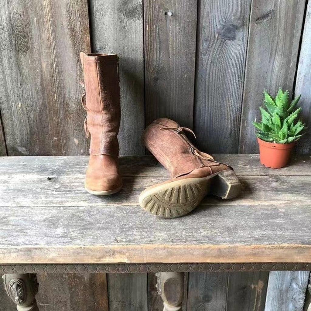Women's brown boots showing the sole