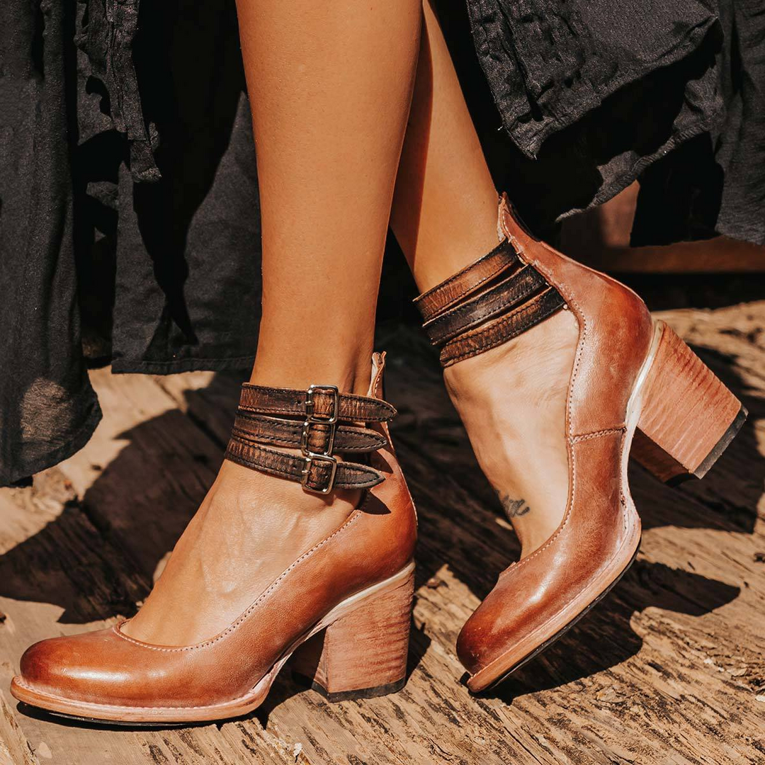 Dark brown block heel ankle boots with three straps