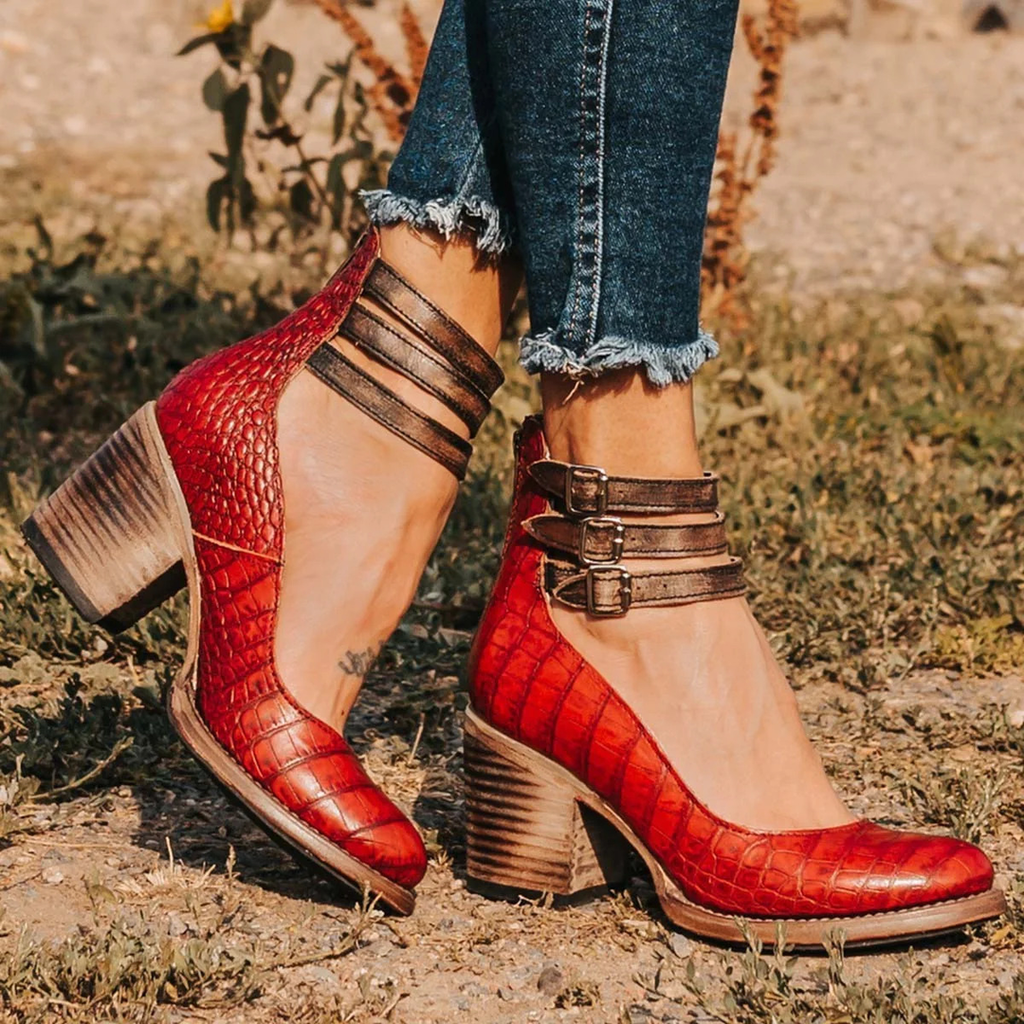 Red snake-effect multi-strap ankle boots