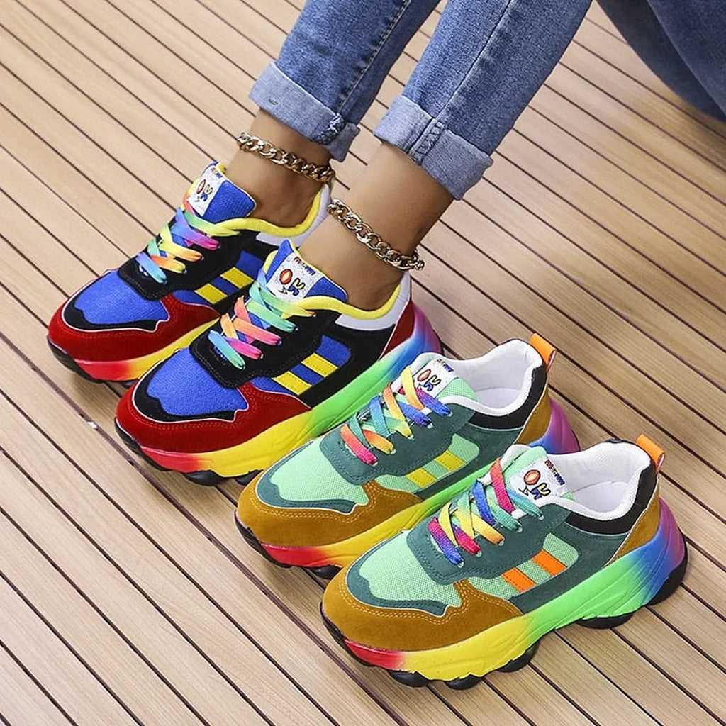 Two pairs of multicolour chunky sneakers side by side