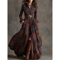 Woman wearing a dark brown plaid belted shirt dress