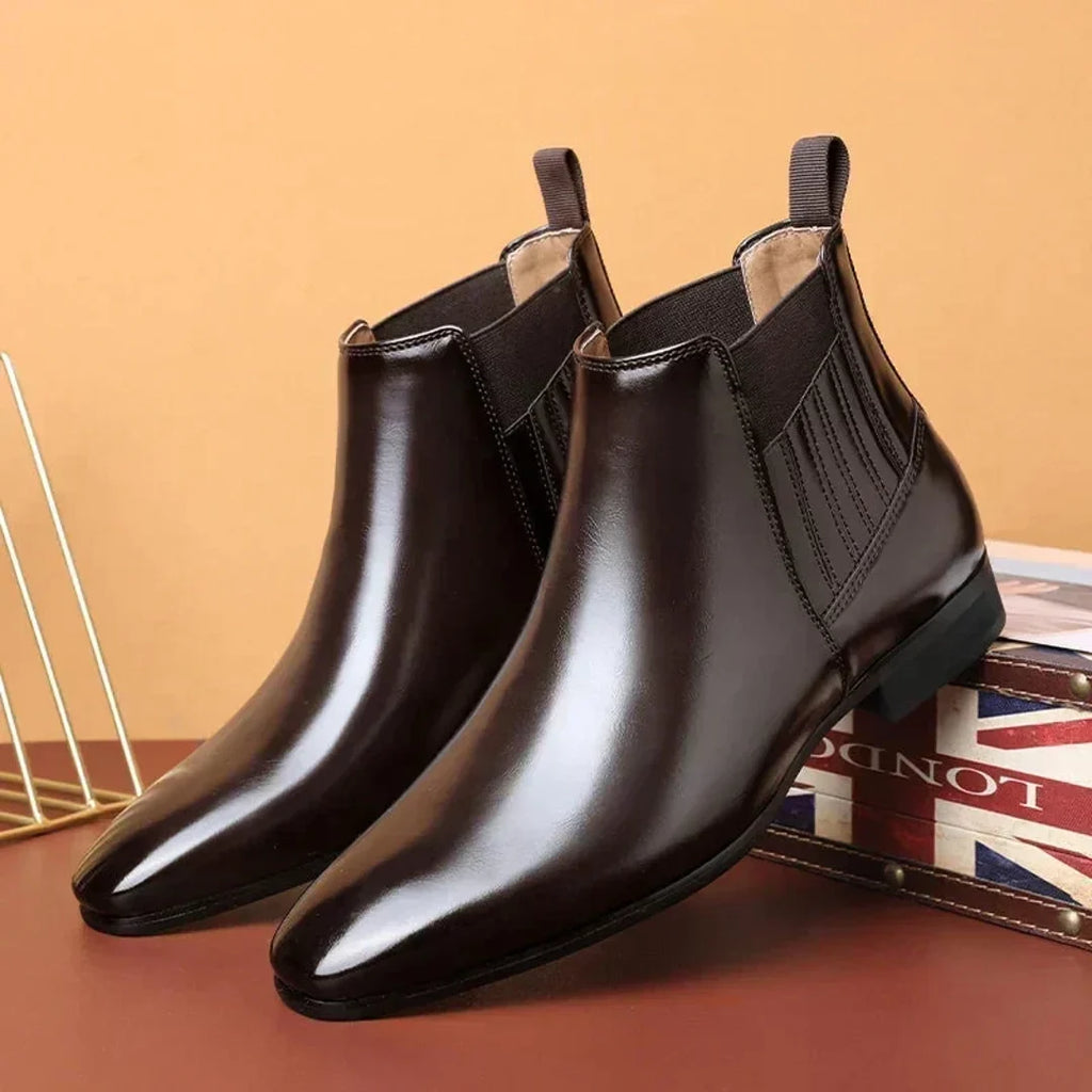 Pair of women's dark brown glossy Chelsea boots