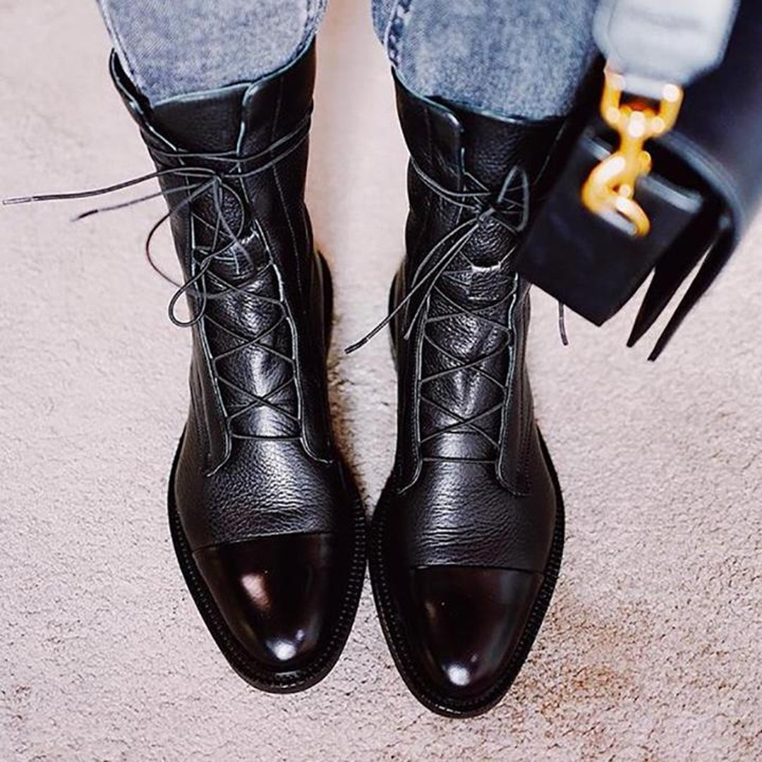Black polished ankle boots with jeans