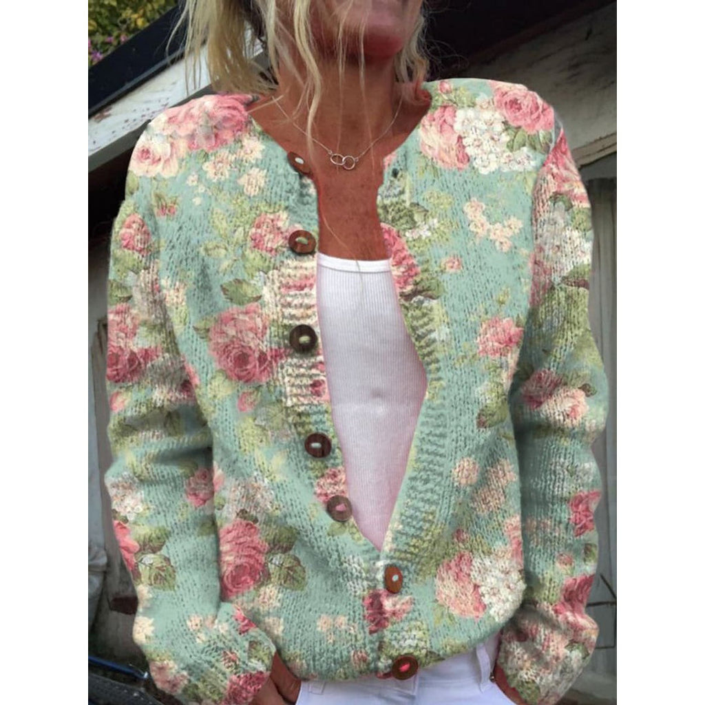 Woman wearing a green floral button cardigan