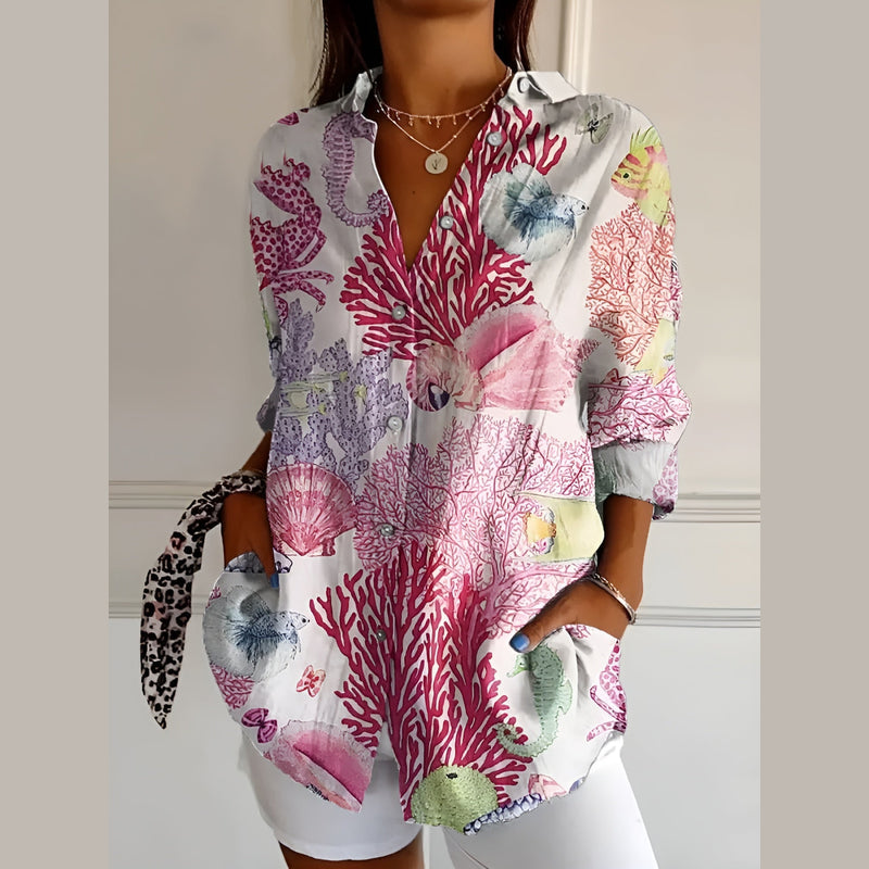 Woman wearing the pink paisley shirt blouse – front view