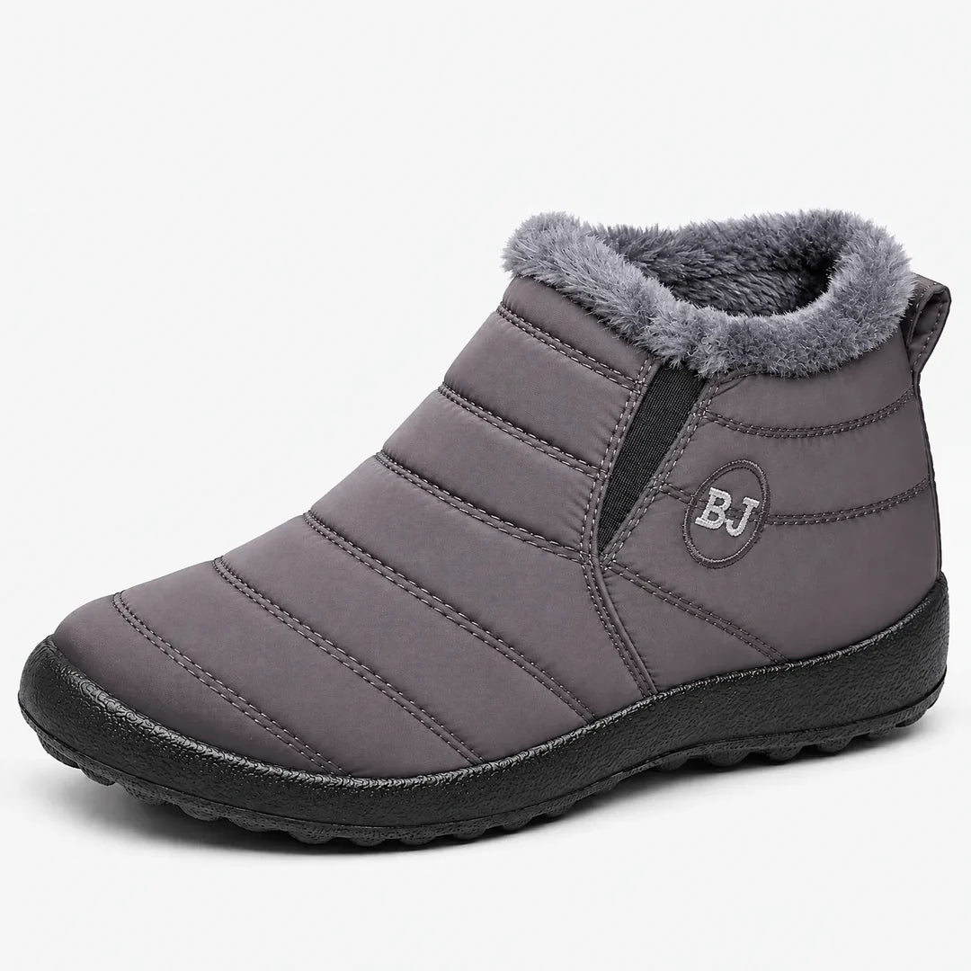 Women's grey quilted ankle boot with pull tab
