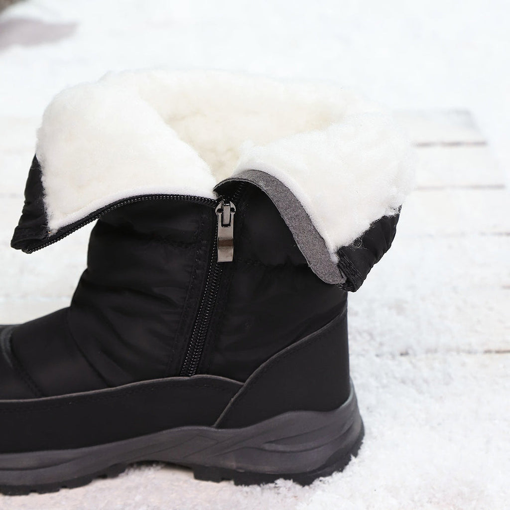 Black winter boot showing the warm lining