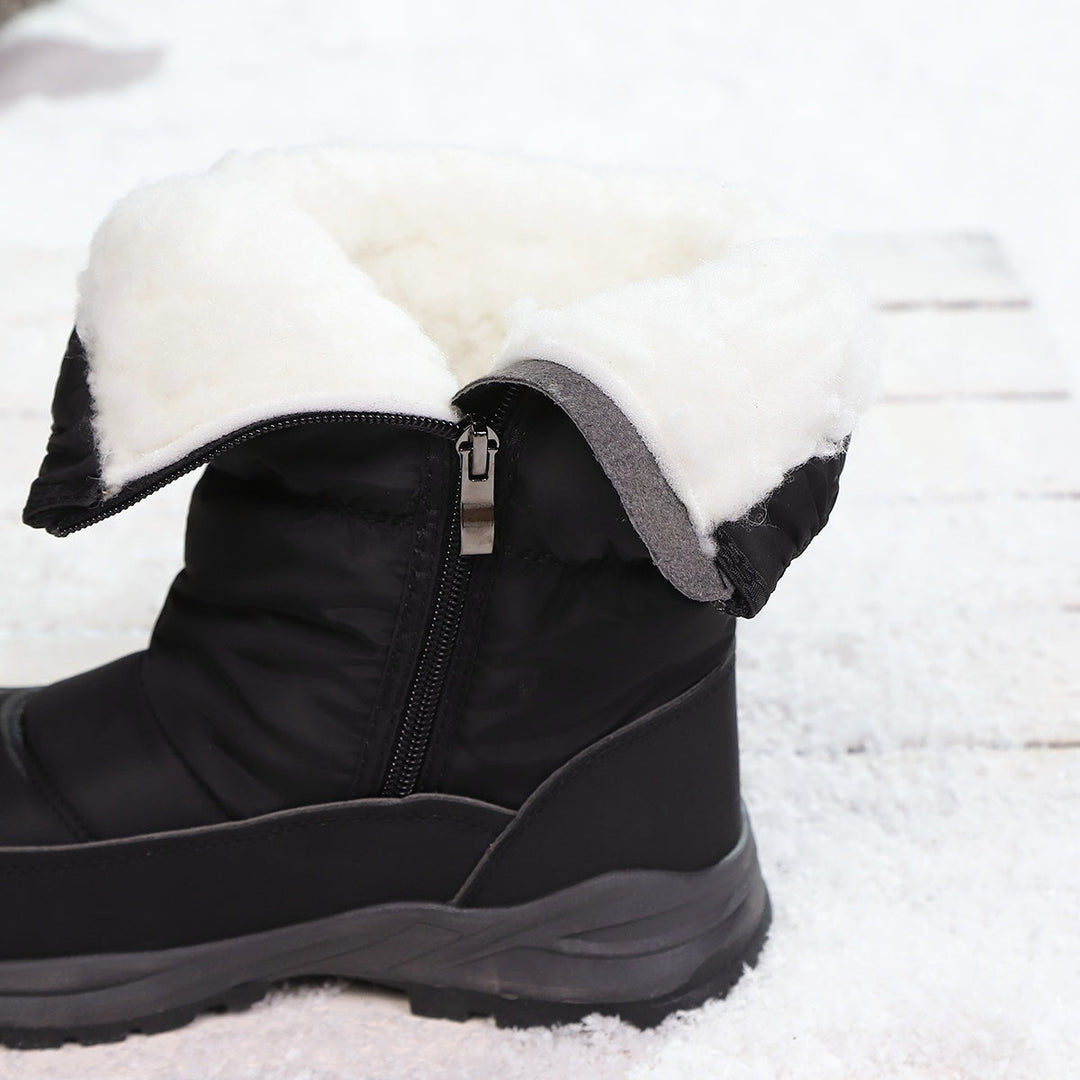 Black winter boot showing the warm lining