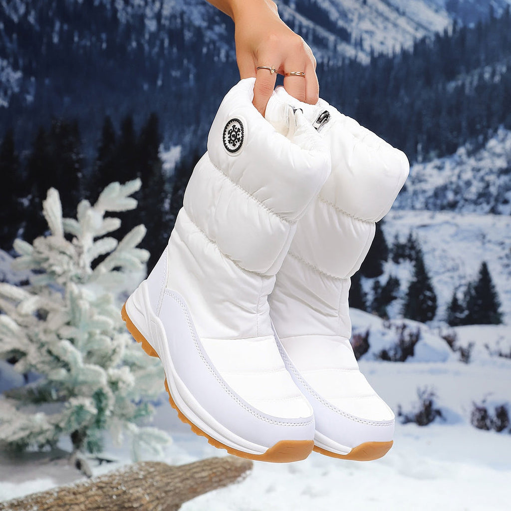 White winter boots with strap detail