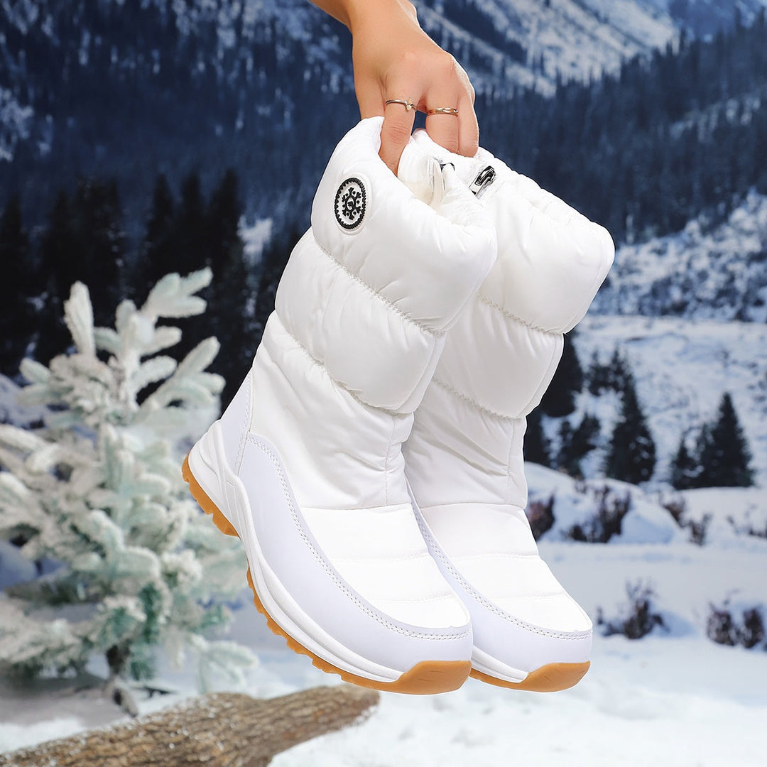 White winter boots with strap detail