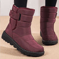 Women's burgundy quilted snow boots with strap