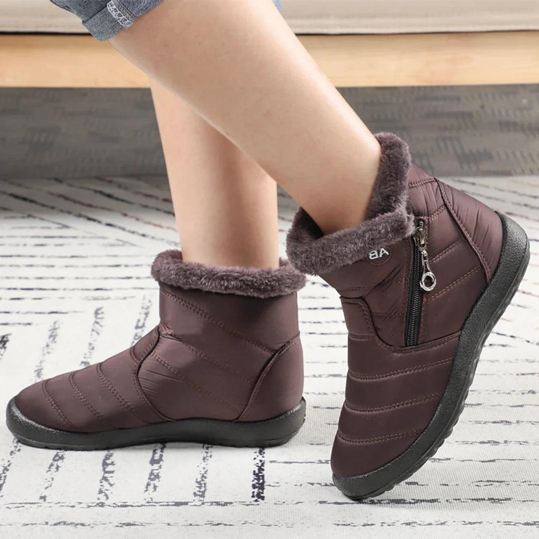 Woman wearing brown winter ankle boots