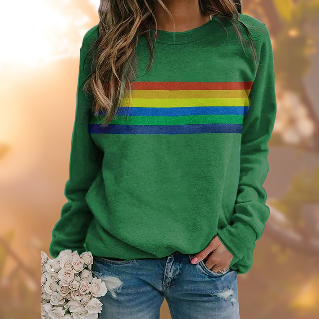 Women's green sweater with rainbow stripes across the chest