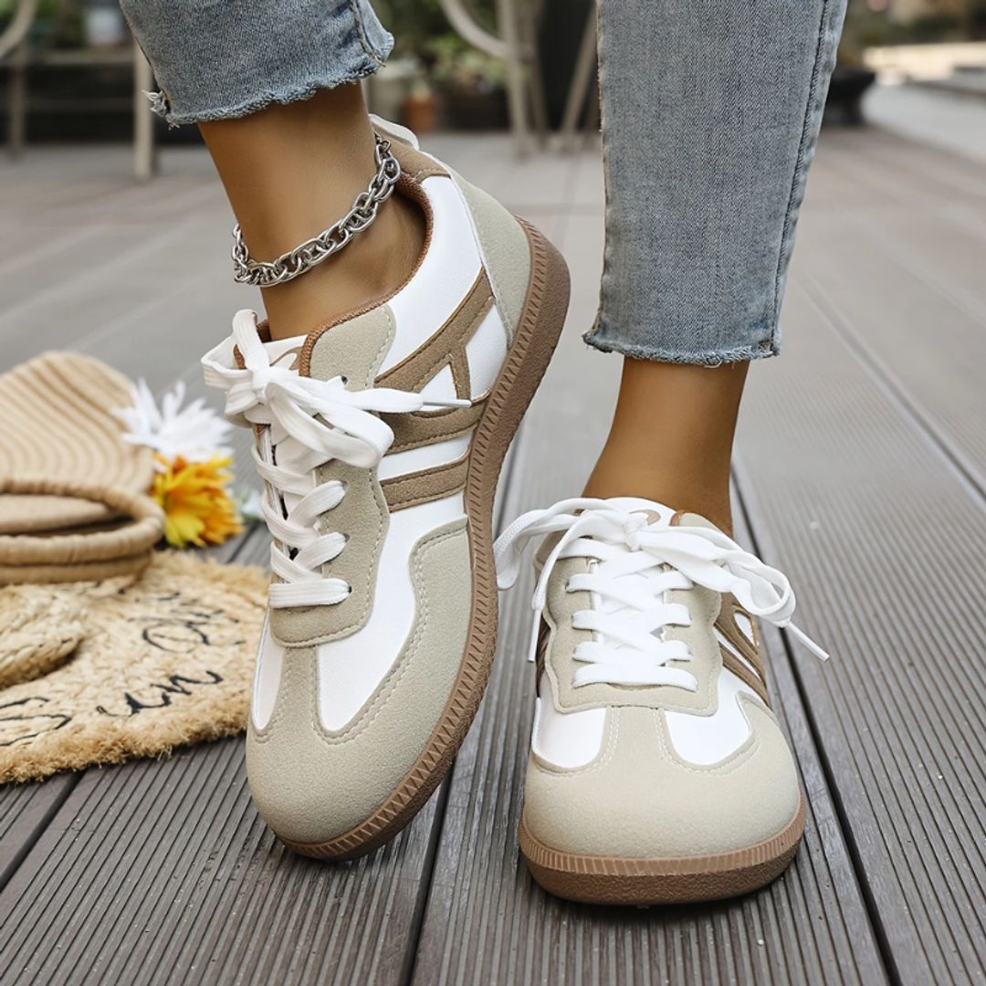 Women's retro contrast stripe sneakers in white taupe, worn