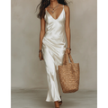 Woman wearing a white satin slip midi dress