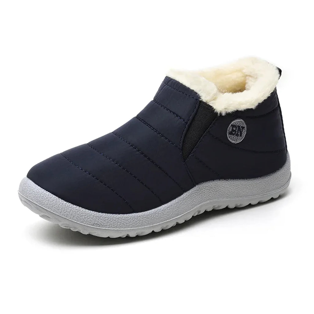Women's navy slip-on quilted ankle boot