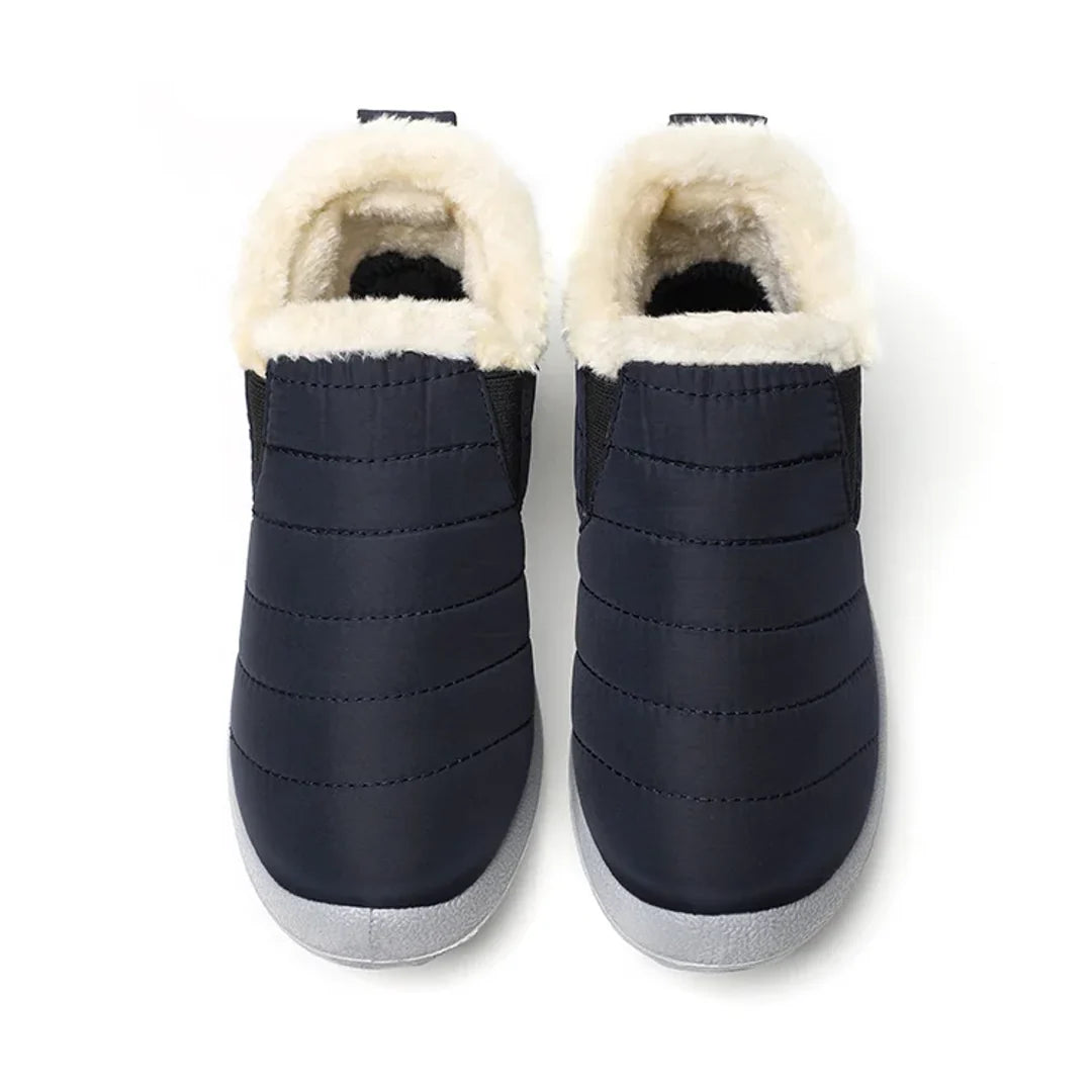 Women's navy quilted ankle boots – front view