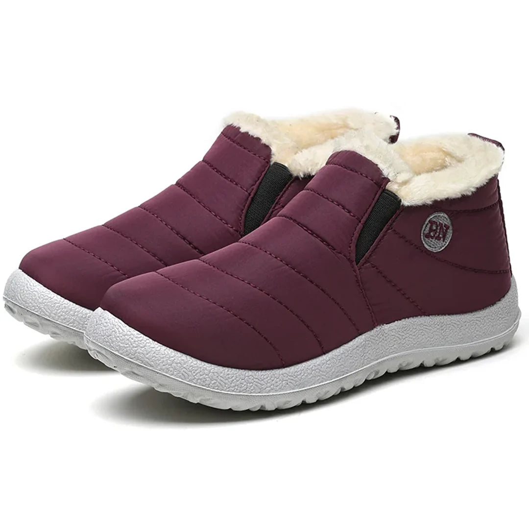 Pair of women's burgundy quilted ankle boots