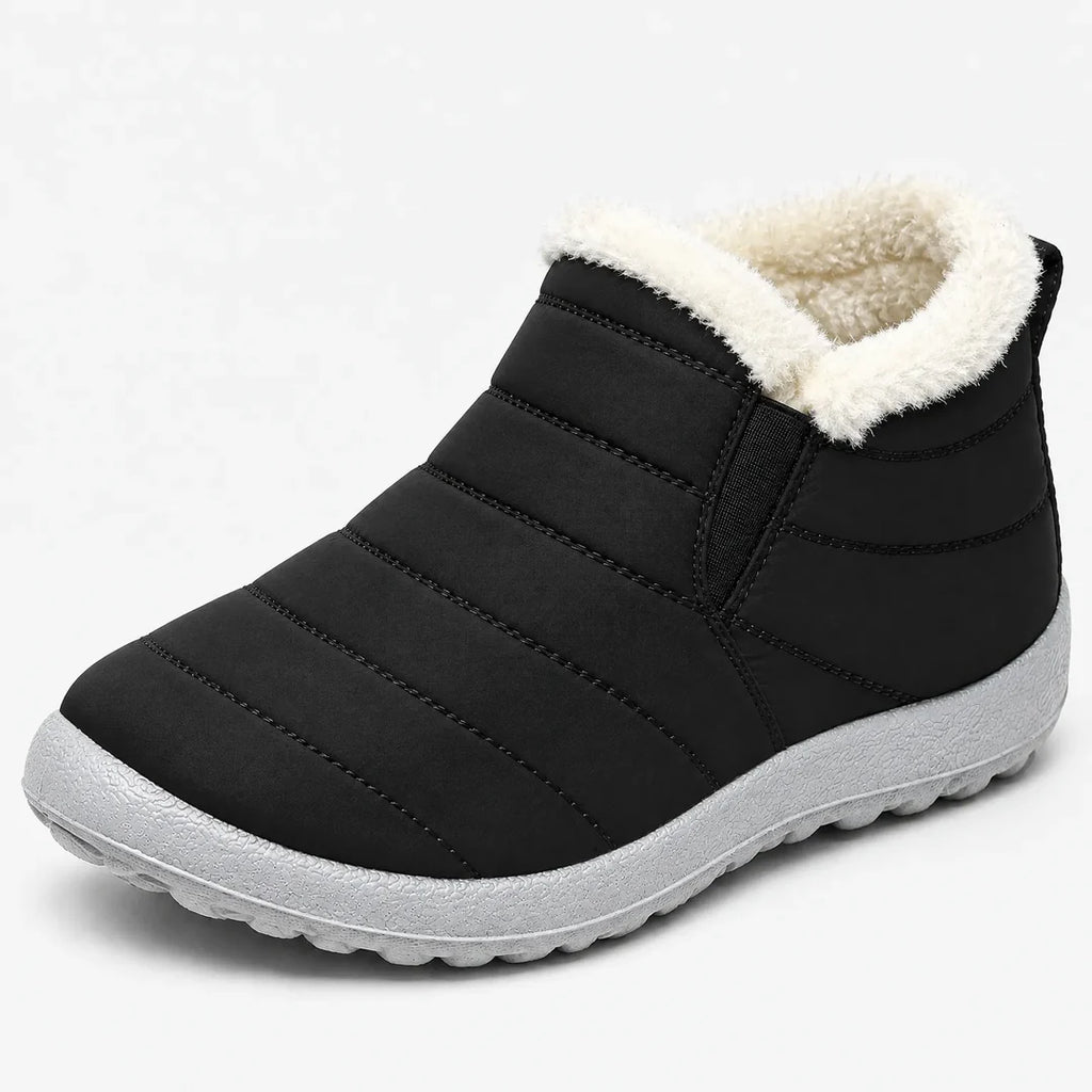 Women's black slip-on quilted ankle boot with cream collar