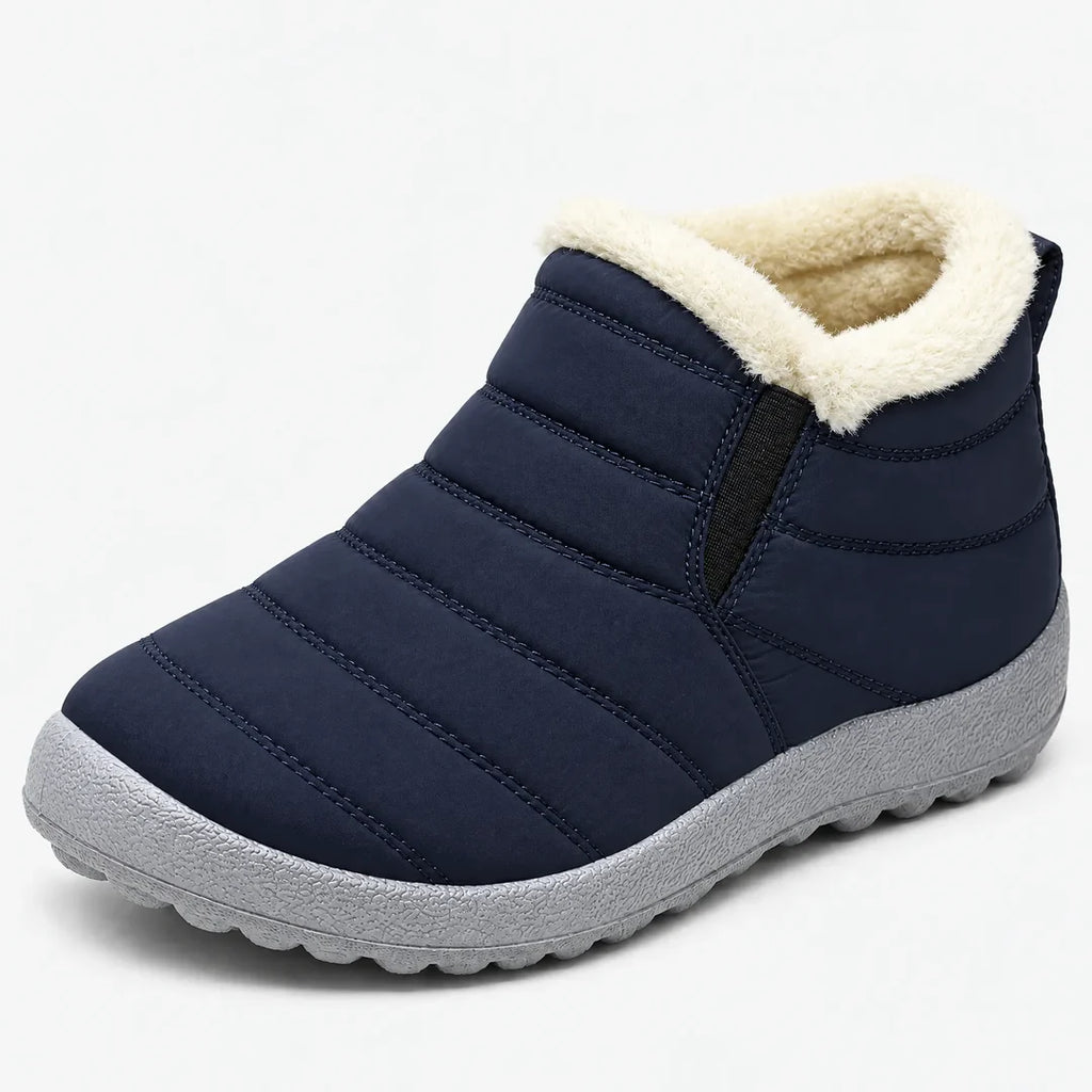 Women's navy quilted ankle boot with cream collar