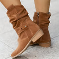 Woman wearing brown slouchy suede-look mid-calf boots